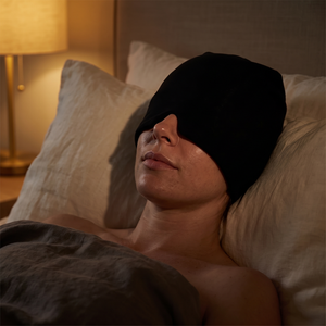 Woman resting with the FrostVeil hood pulled over her eyes