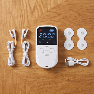 What's in the box: device, ear clips, spare pads, charging cable